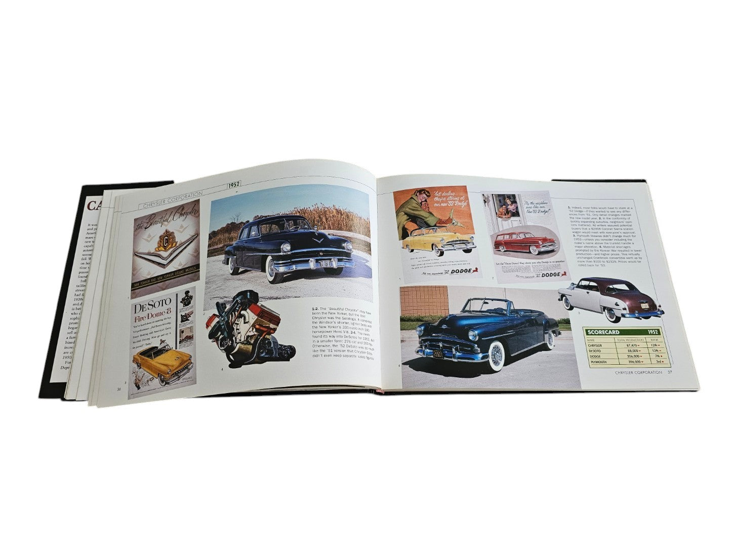 Automoto Bookshop Cars of the 1950's hardcover book open to a page featuring vintage 1952 Chrysler car advertisements.