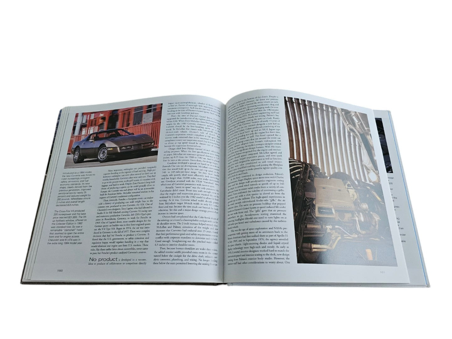 Automoto Bookshop hardcover book Corvette: America's Sports Car open to pages featuring a classic Corvette and engine
