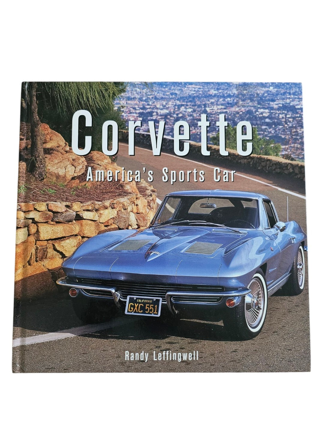Automoto Bookshop hardcover book Corvette America's Sports Car featuring a blue vintage Corvette on the cover