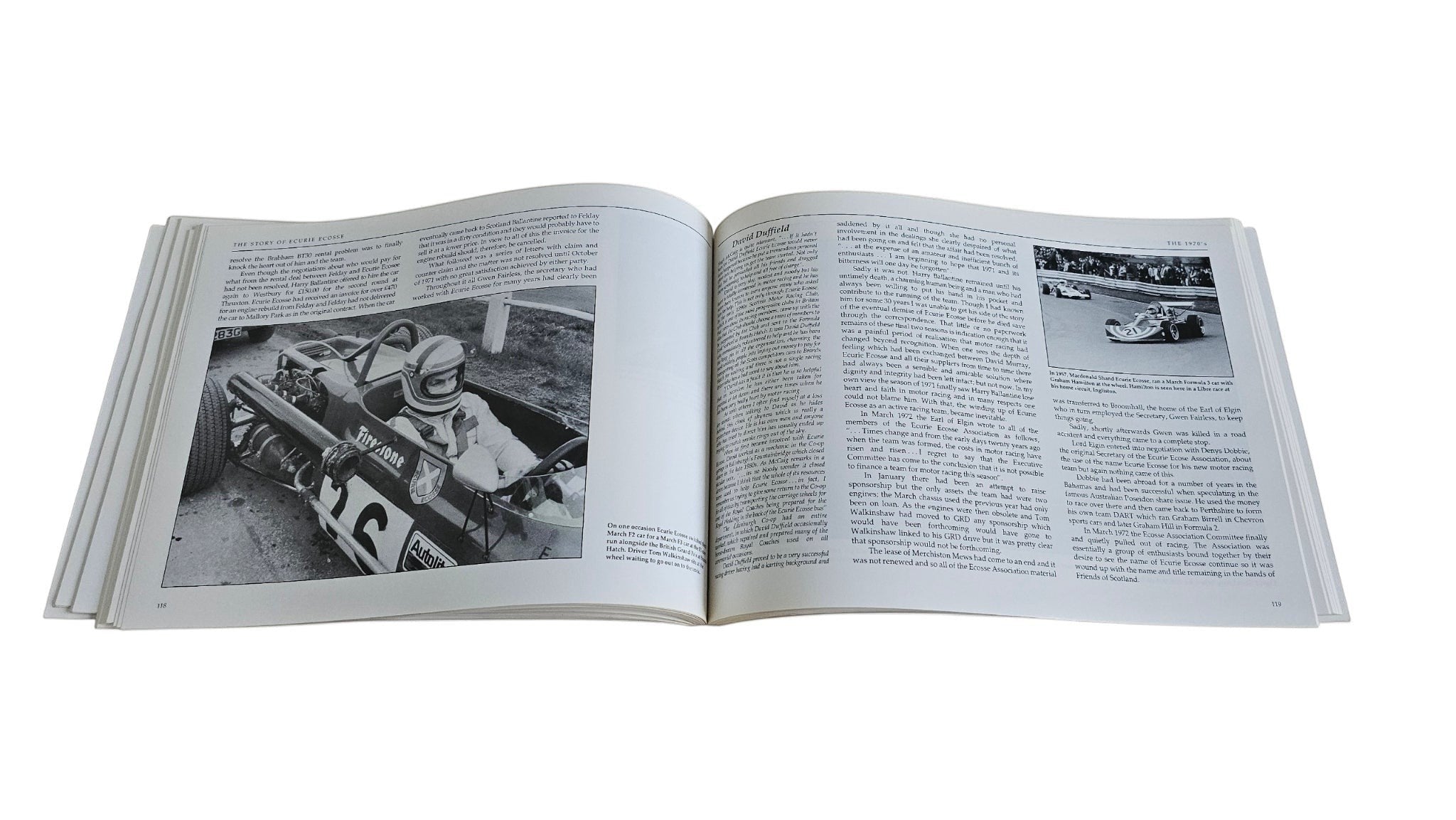 Ecurie Ecosse motorsport history book, open spread with race car and driver photo.