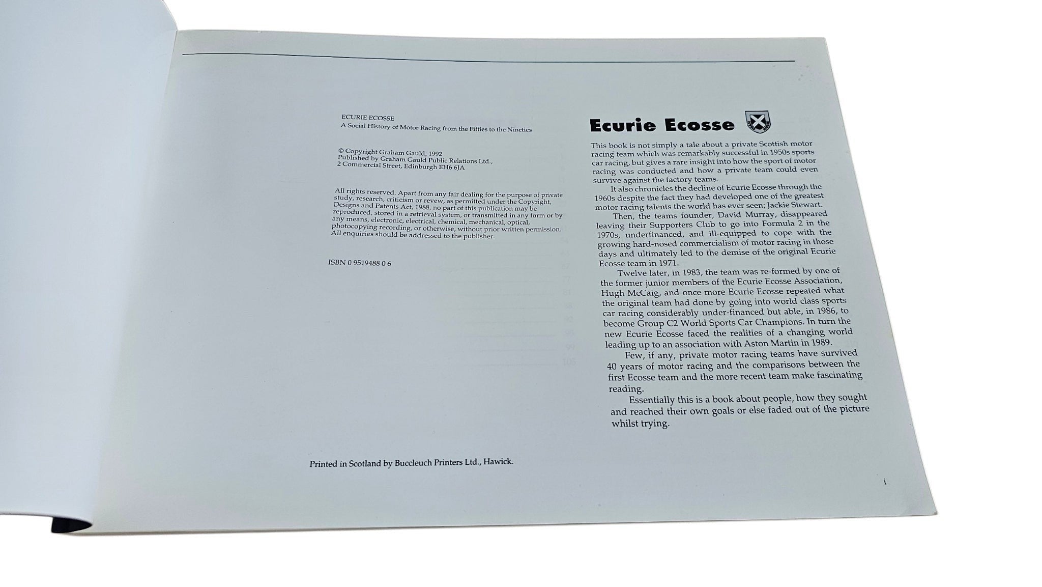 Ecurie Ecosse motorsport history book, open back page with text and crest header.