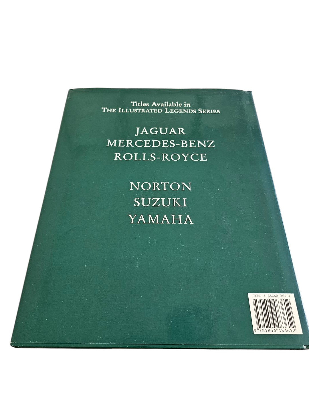 Back cover of Automoto Bookshop Jaguar The Illustrated Motorcar Legends book in green with white text list.