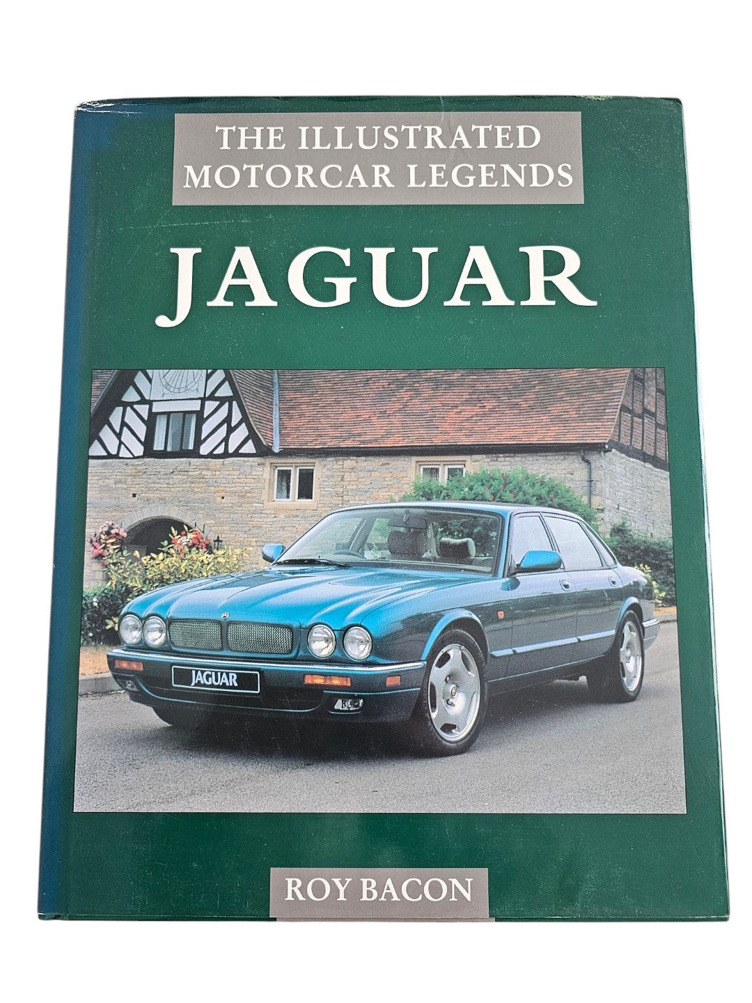 Automoto Bookshop pre-owned Jaguar The Illustrated Motorcar Legends hardcover book by Roy Bacon with green cover