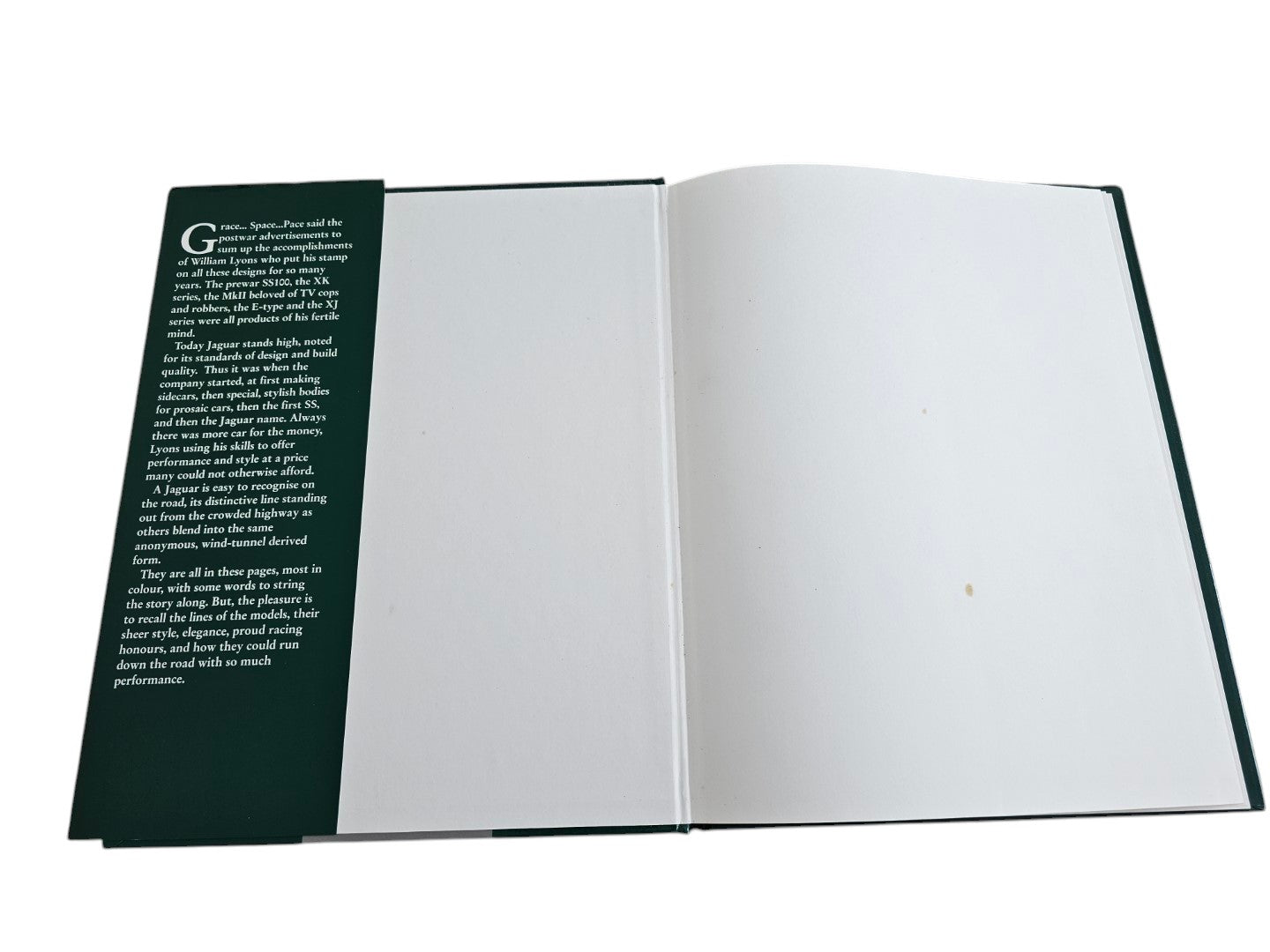 Automoto Bookshop pre-owned Jaguar Illustrated Motorcar Legends book open to the inside dust jacket flap