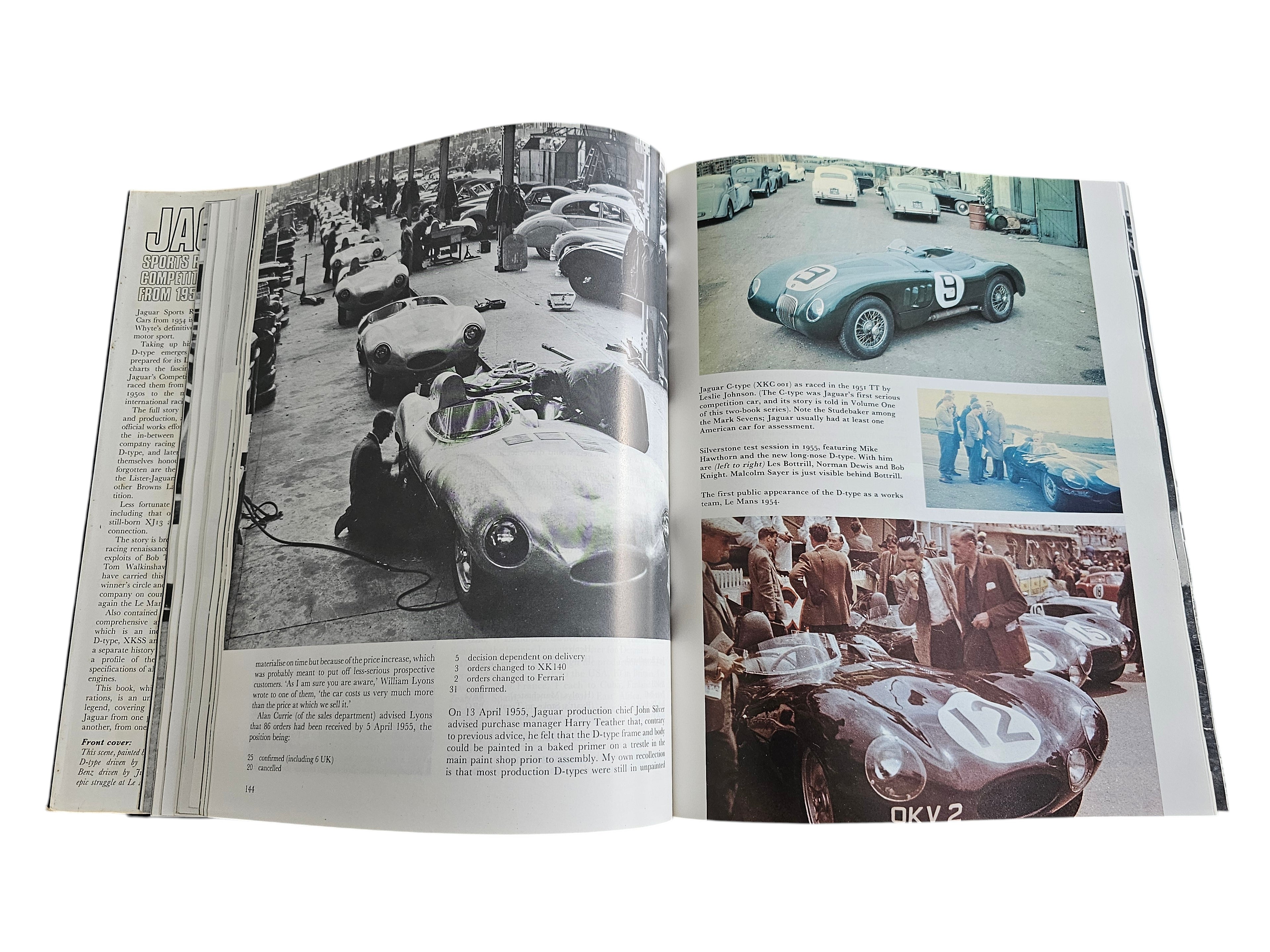 Automoto Bookshop vintage Jaguar sports racing car history book open to pages showing black and white D-type photos