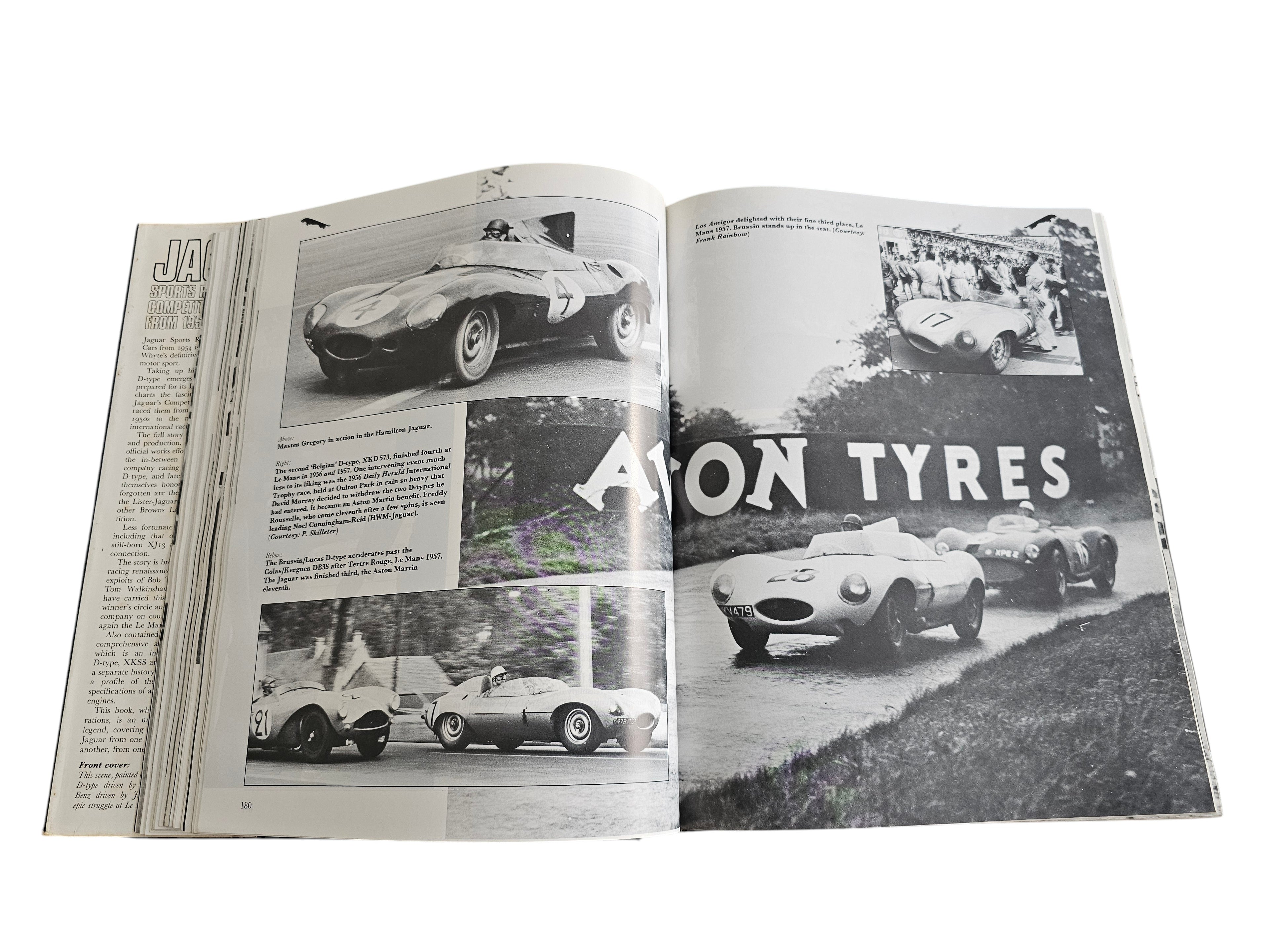 Automoto Bookshop vintage Jaguar racing book open to black and white photos of D-type cars at Le Mans