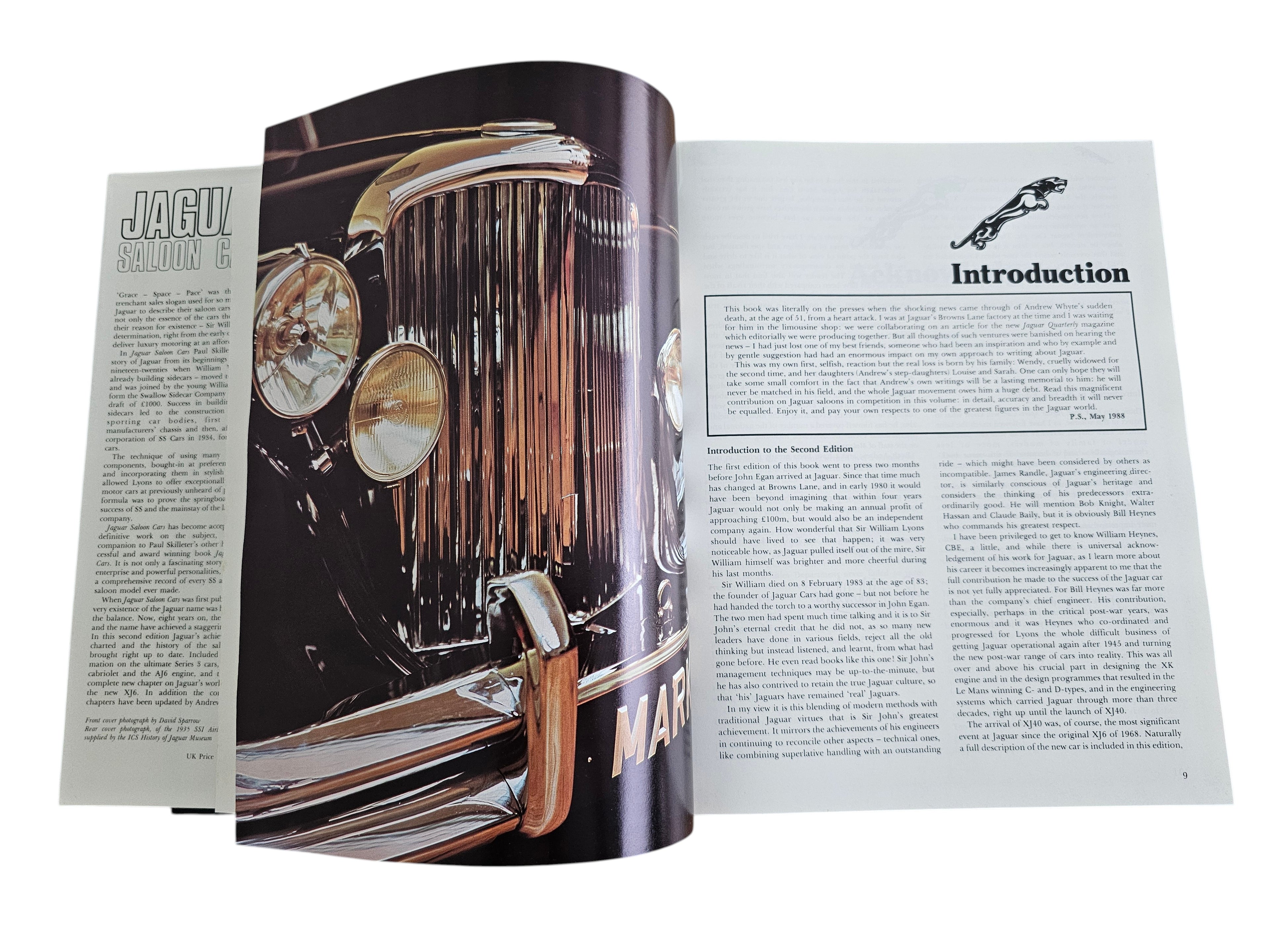Automoto Bookshop Jaguar Saloon Cars hardcover book open to the introduction page featuring a classic Jaguar grille