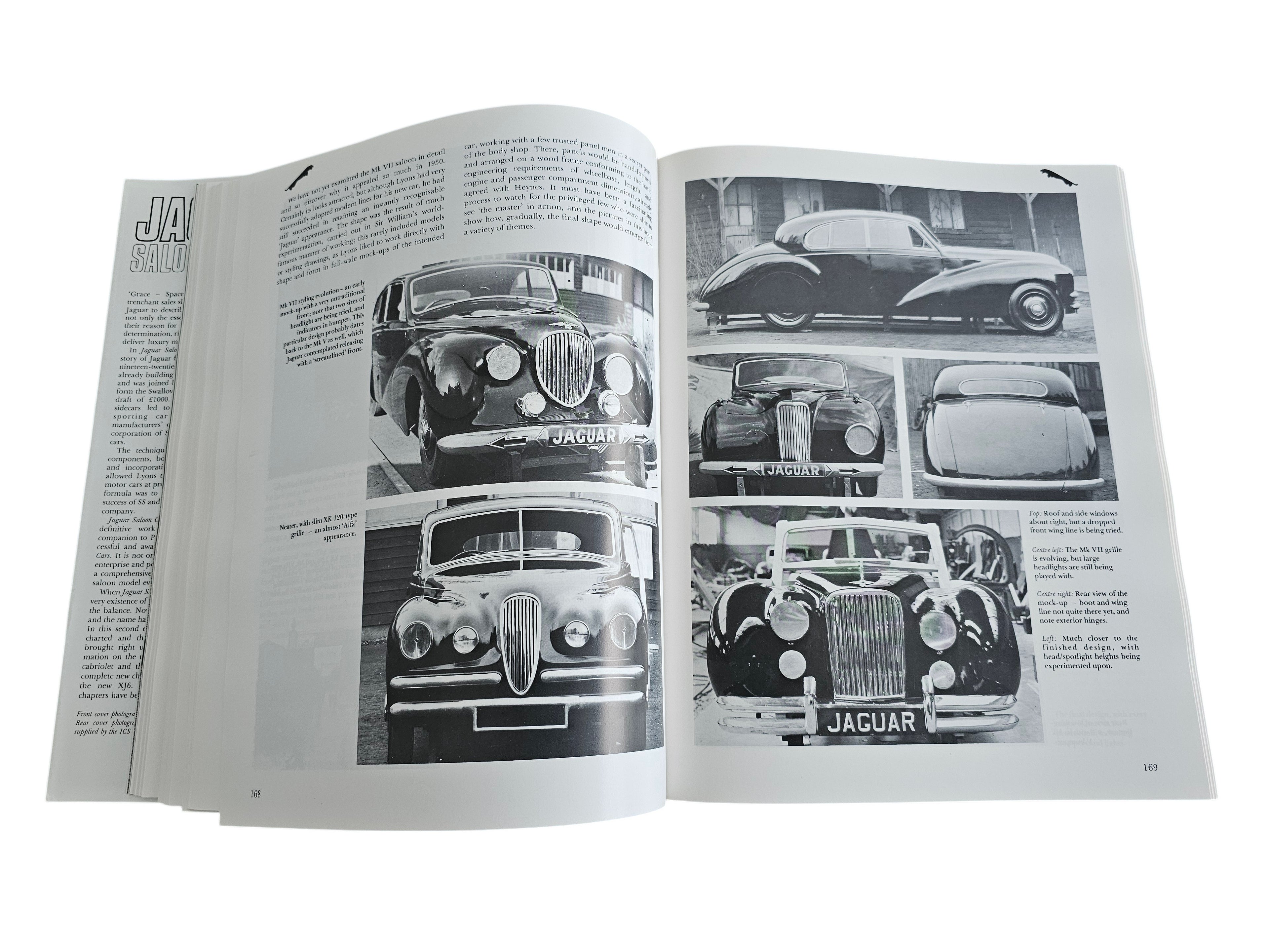 Open pages of Automoto Bookshop Jaguar Saloon Cars book featuring historical black and white photos of classic Jaguars