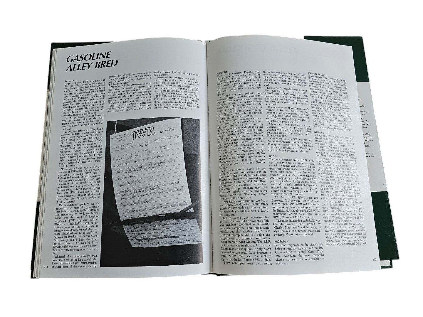 Automoto Bookshop hardcover copy of Jaguar Victory '90 showing an open page with text and a TWR job list photograph.