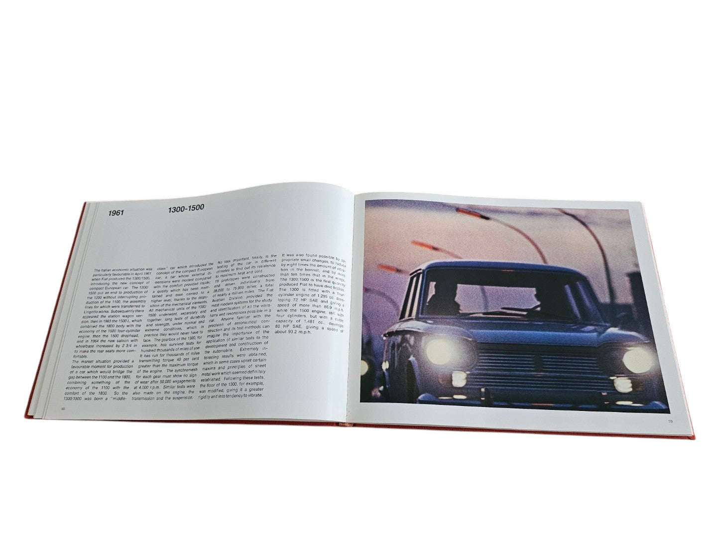 Automoto Bookshop Linea Fiat 1966 first edition open to a page featuring a vintage Fiat 1300-1500 car photograph.