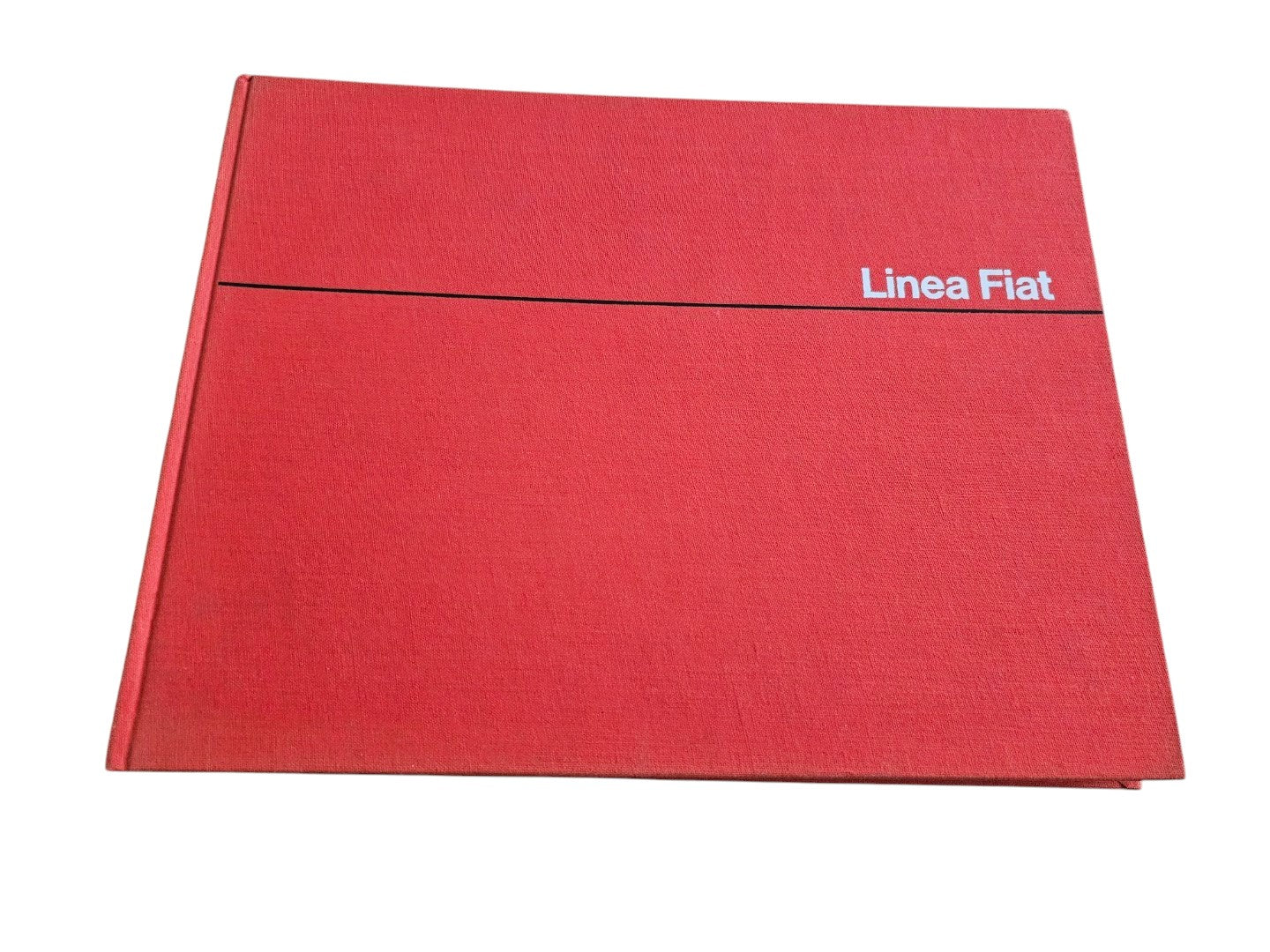 Automoto Bookshop 1966 first edition Linea Fiat hardcover book with a vibrant red linen cover and minimalist design.