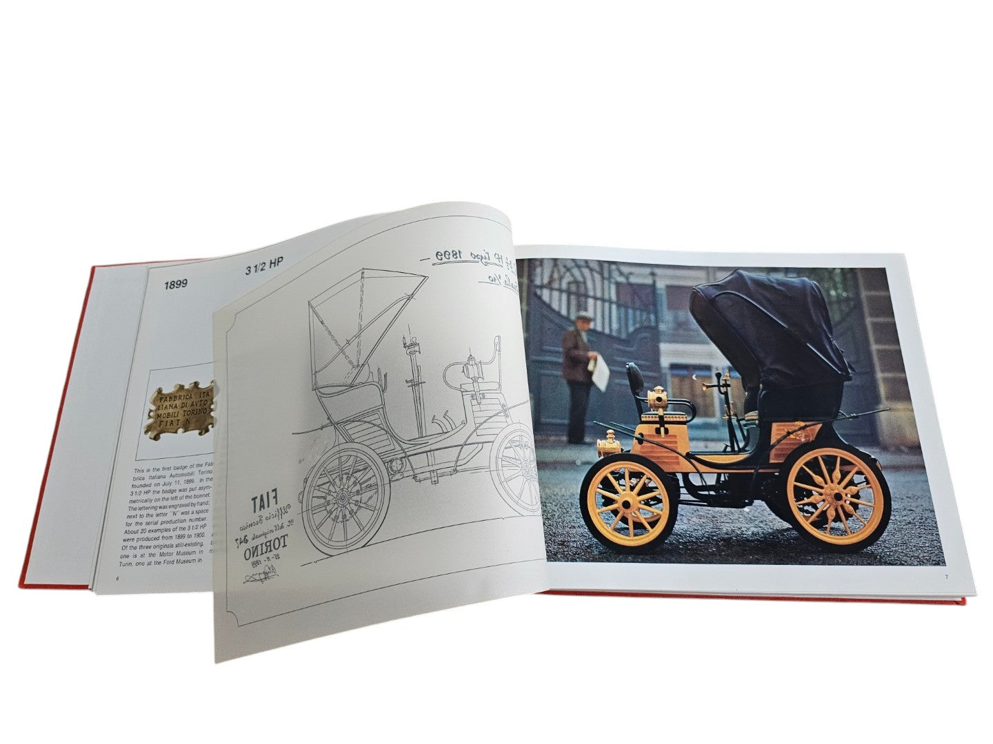 Automoto Bookshop Linea Fiat 1966 first edition book open to a page featuring a vintage 1899 Fiat 3 1/2 HP car.