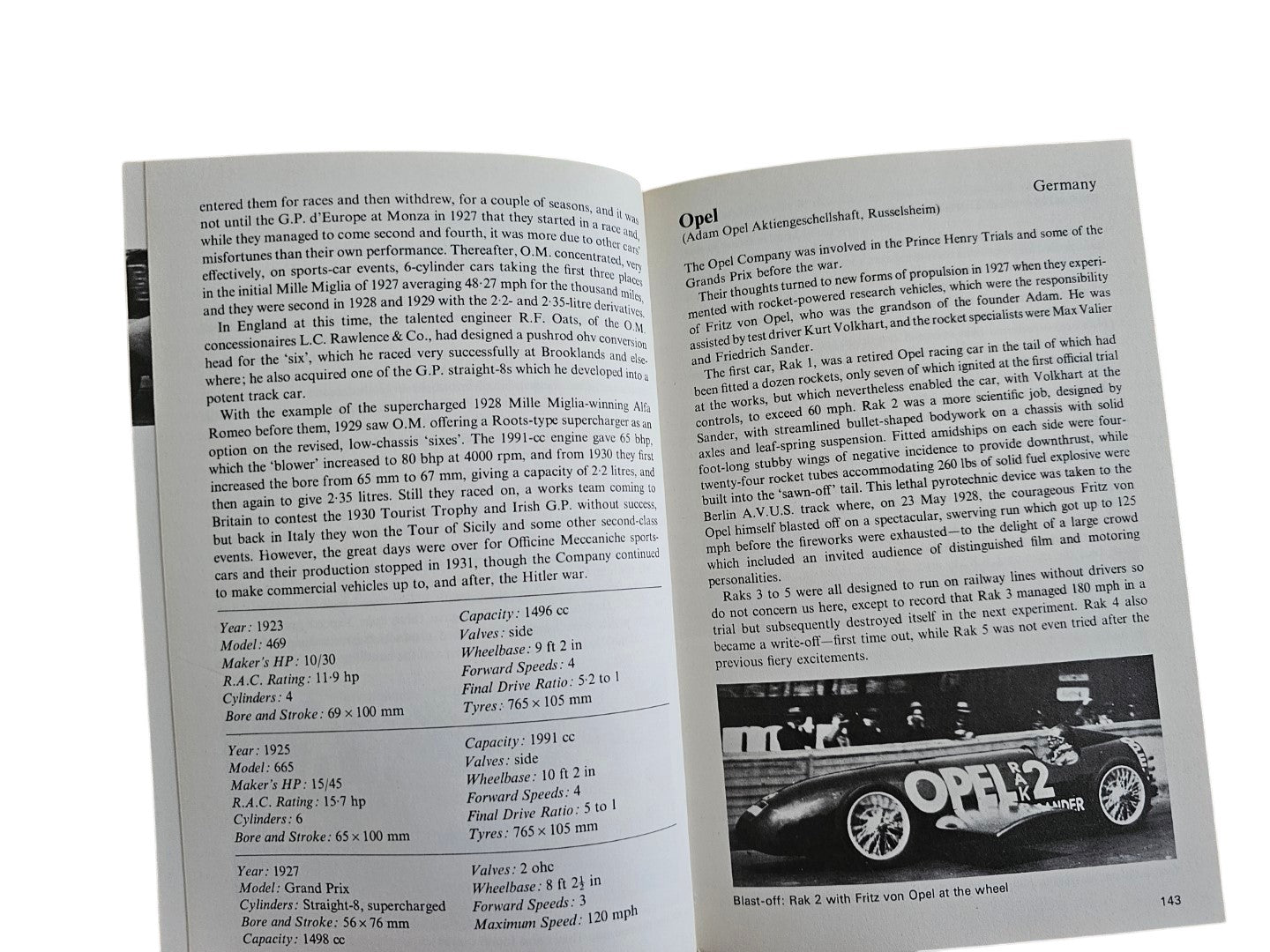 Automoto Bookshop vintage sports and racing car guide showing technical specifications and an Opel Rak 2 race car