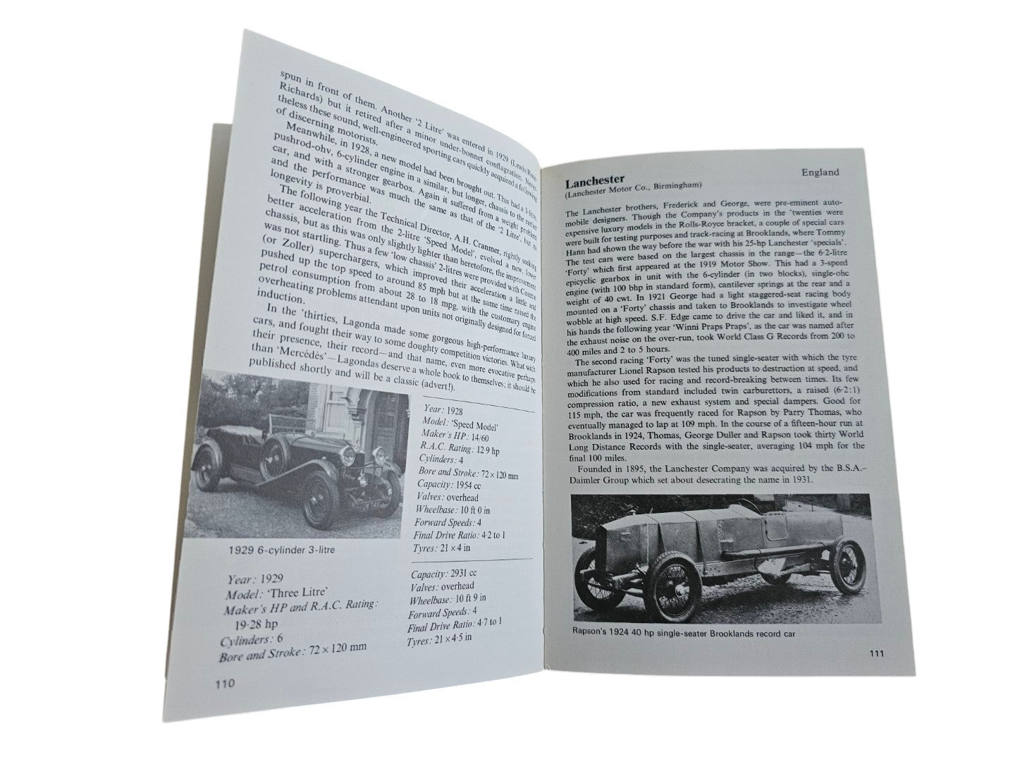Open pages of Automoto Bookshop vintage sports and racing car guide featuring historical text and classic car photos.