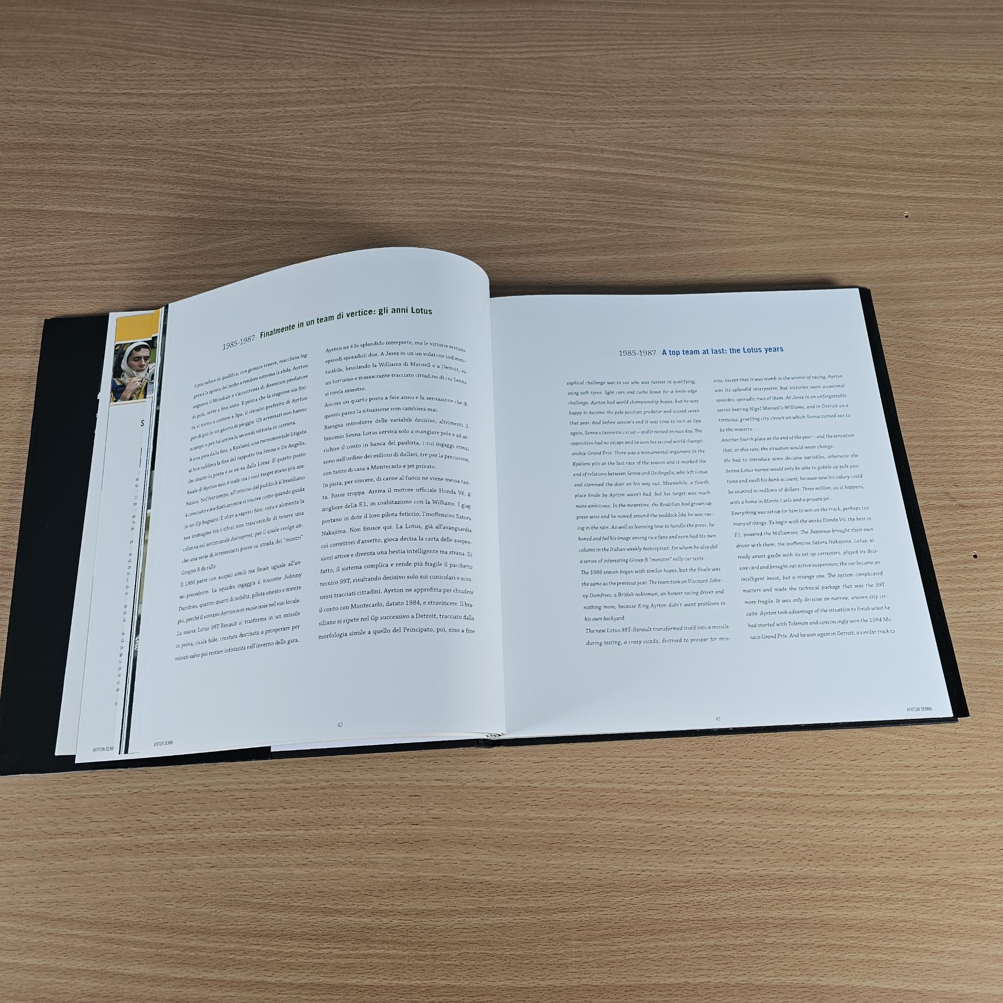 Open hardcover book spread showing two pages of small printed text and headings.