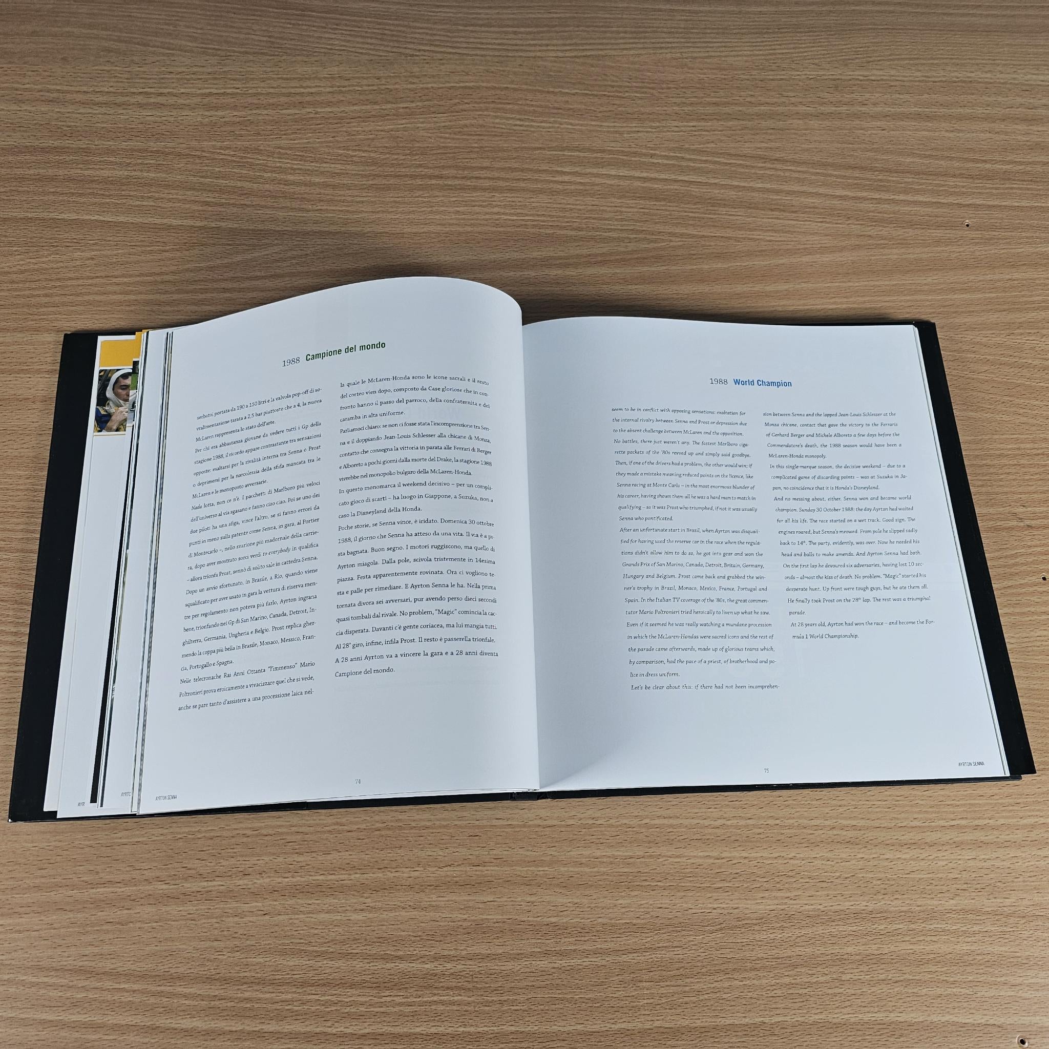 Open hardcover book spread with tightly packed paragraphs on both pages.