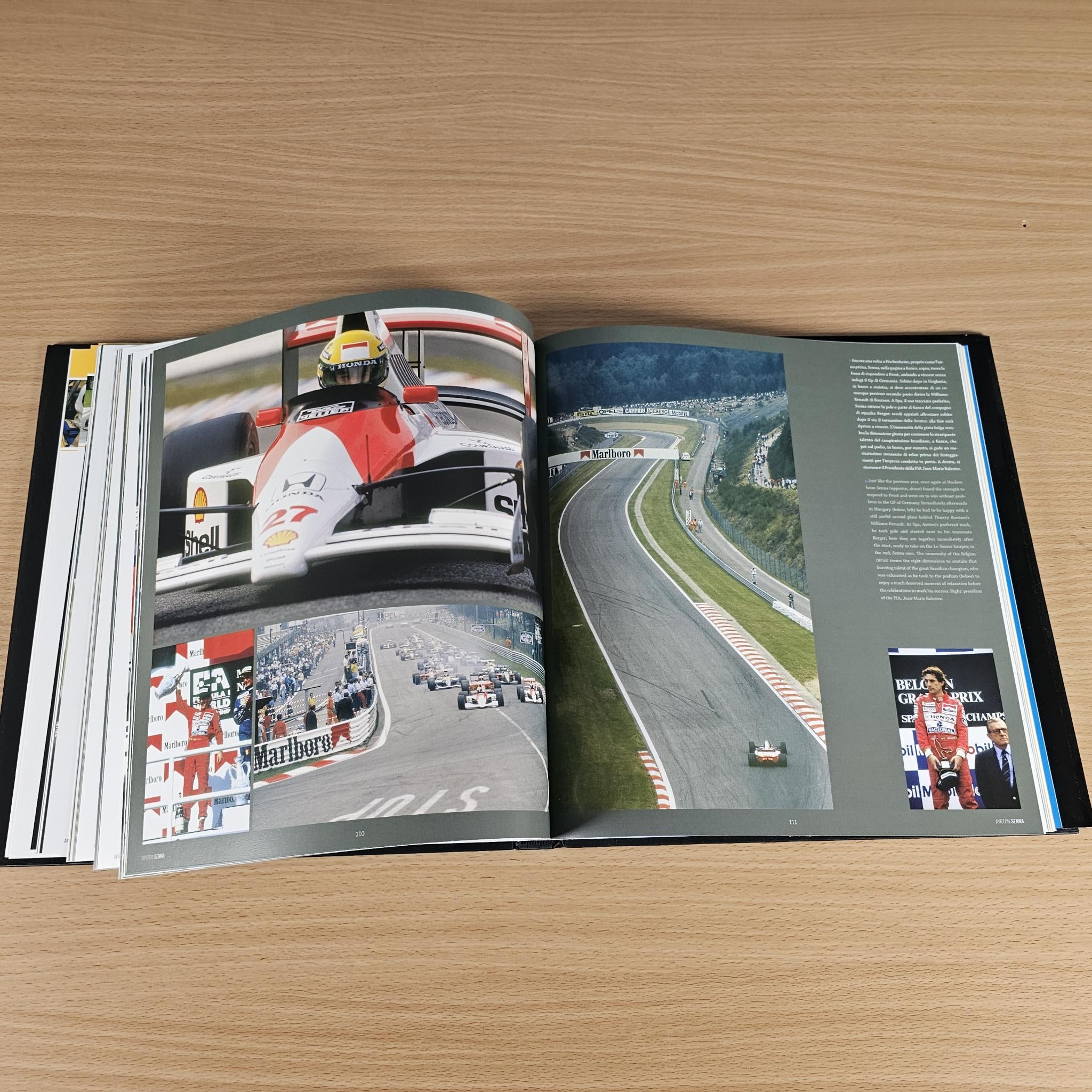 Open hardcover book spread with race photos, track image on the right, and captions.