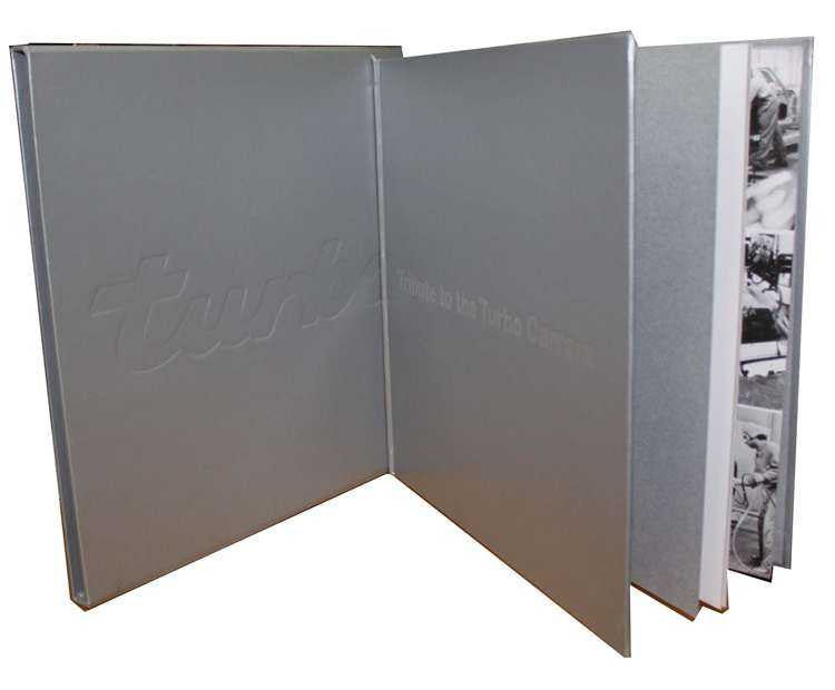 Gray presentation book with embossed title, open cover