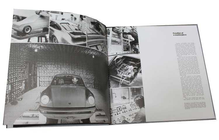 Open photo book with car images on left and text on right page