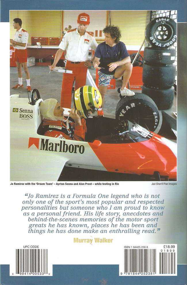 Racing memoir back cover with orange race car, drivers, and summary text