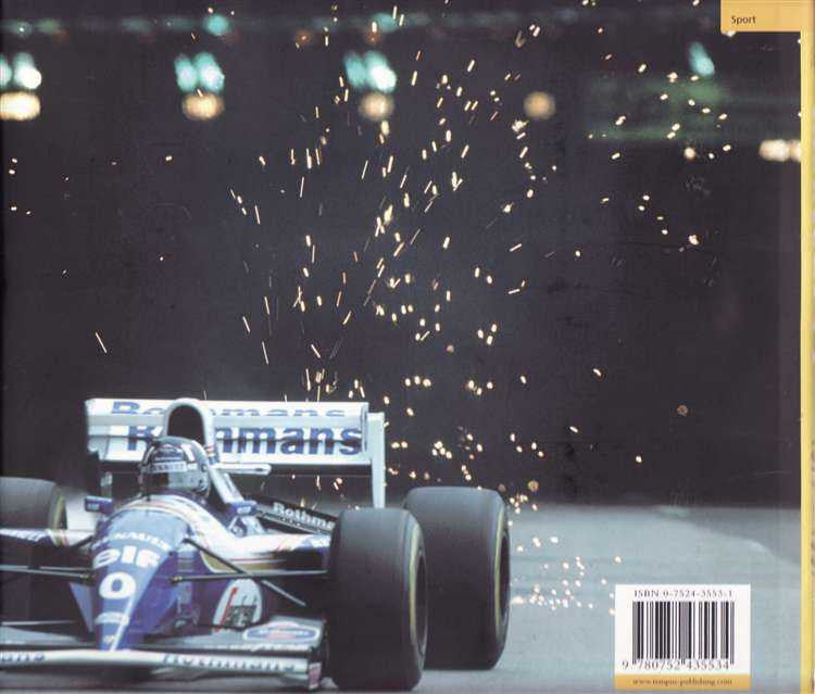 Formula 1 race car with Renault branding, front view, sparks near track