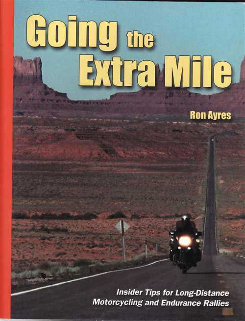 Motorcycling guidebook front cover with title, author name, motorcycle on road