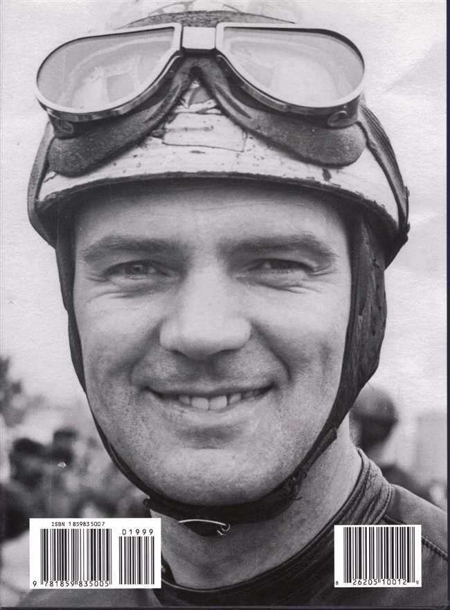 Racing helmet with dark goggles and smiling face close-up