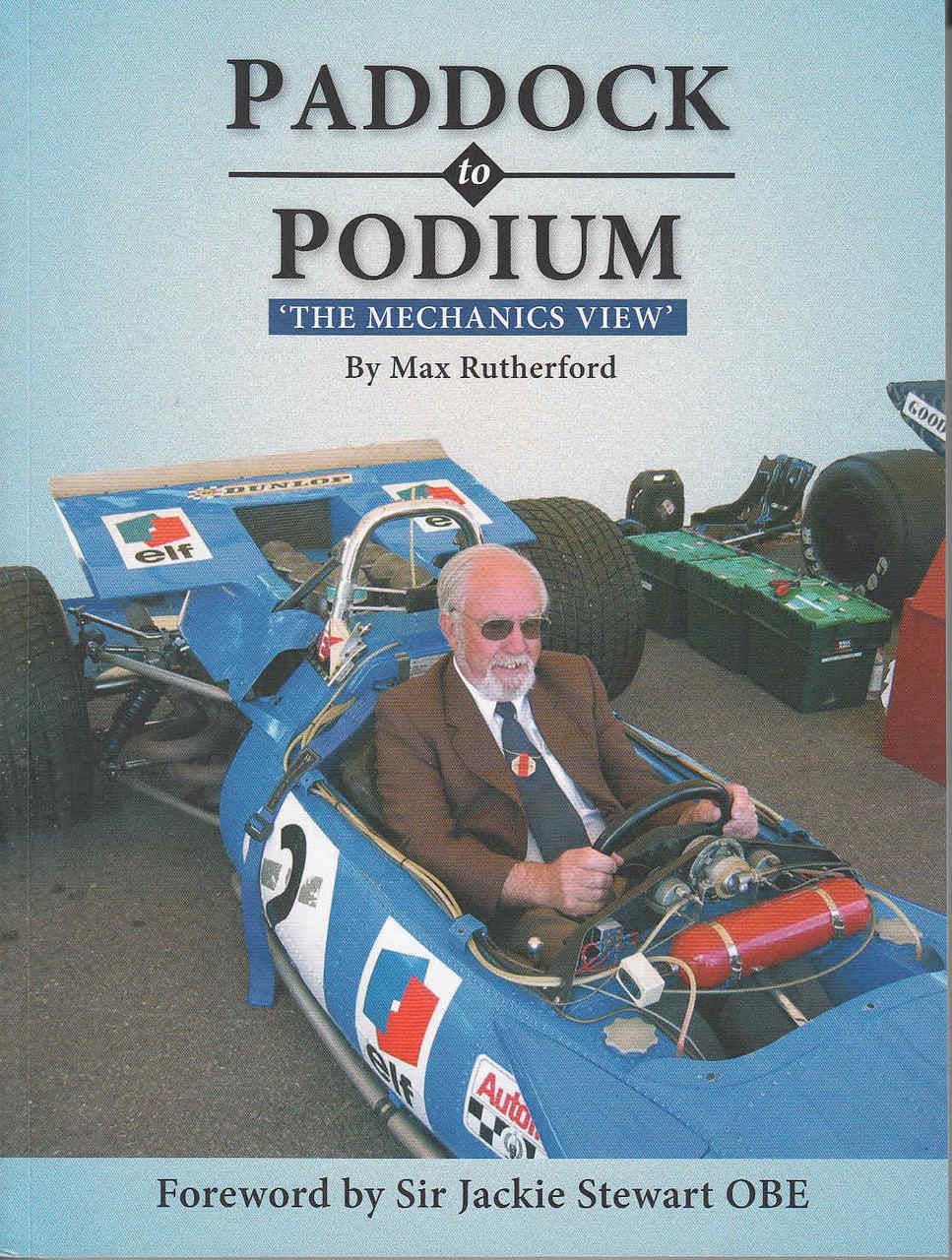 Racing mechanics book cover with title text and man beside open-wheel car