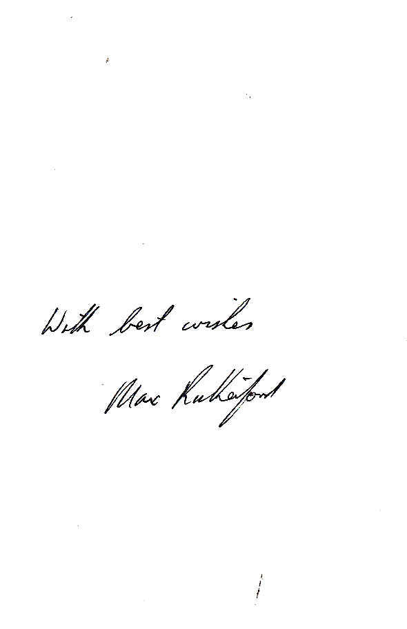 Signed book page with handwritten author signature on a white background