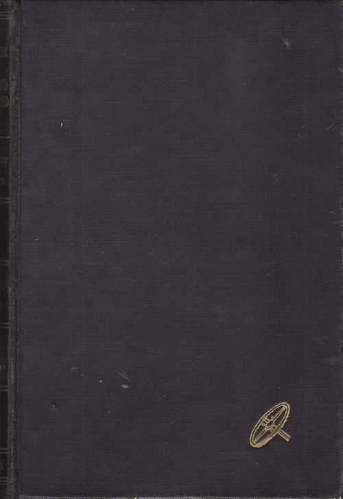 Dark hardcover book with small gold emblem on front cover