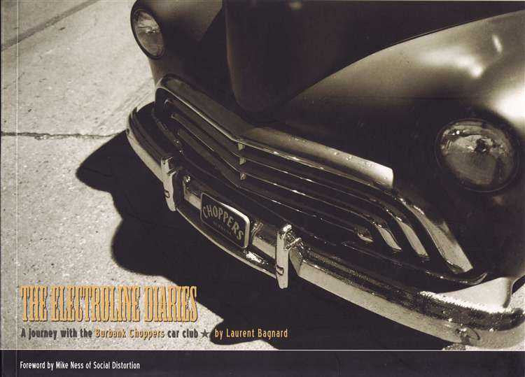 Vintage car book cover with close-up of dark front grille and round headlights