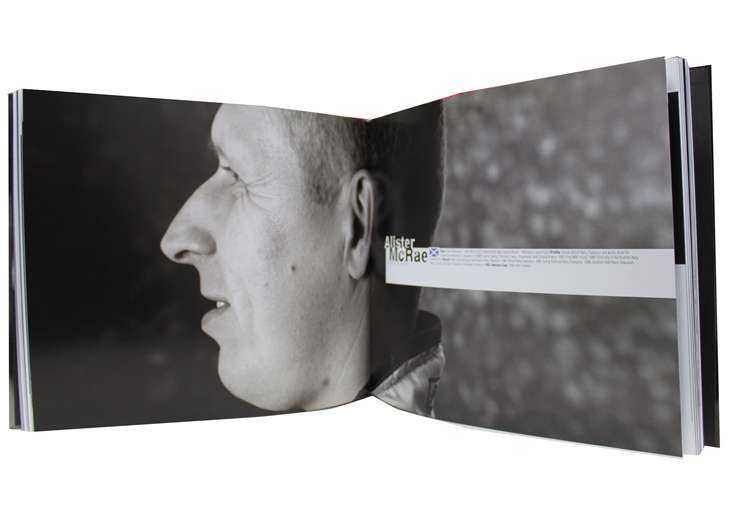 Signed photo book open to black-and-white portrait page