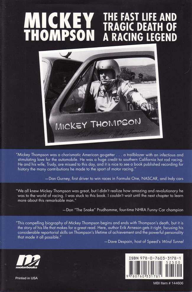 Book back cover with racing photo, description text, and ISBN number