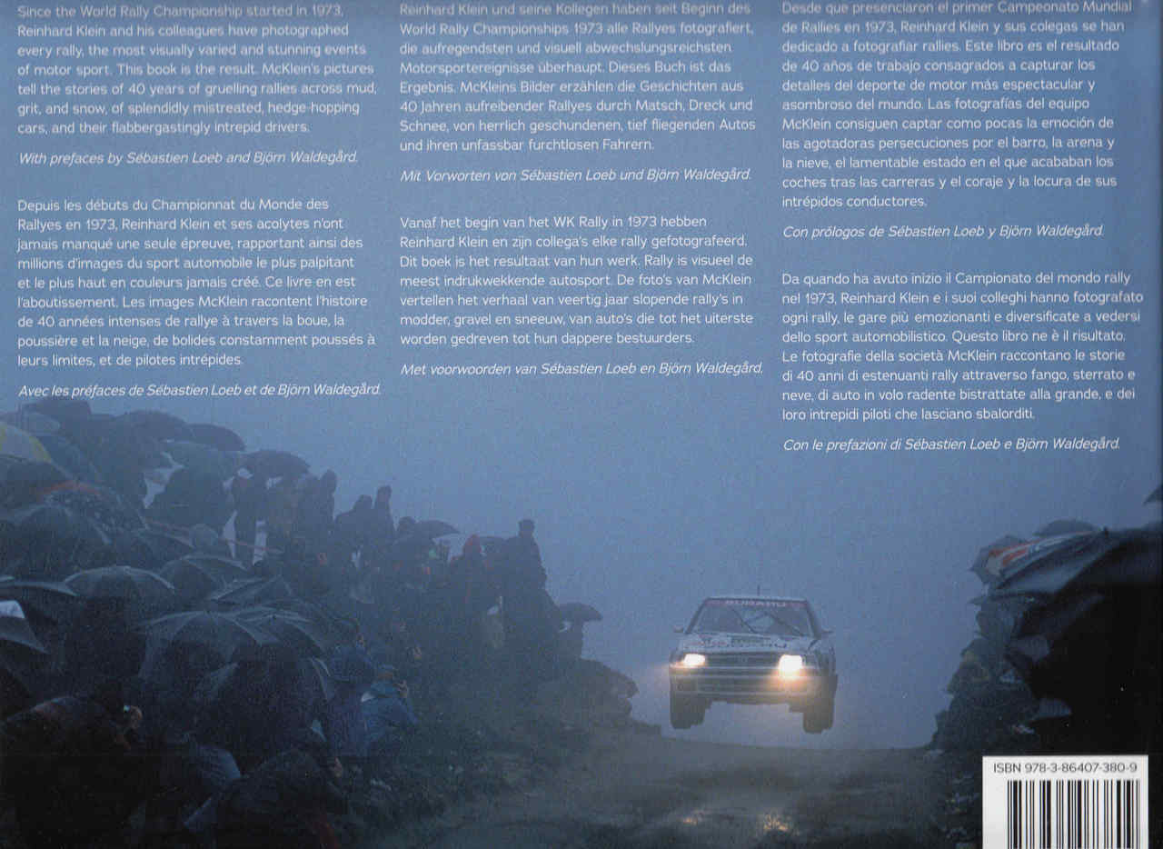Rally car cover art with headlights on and dense dust trail in the foreground