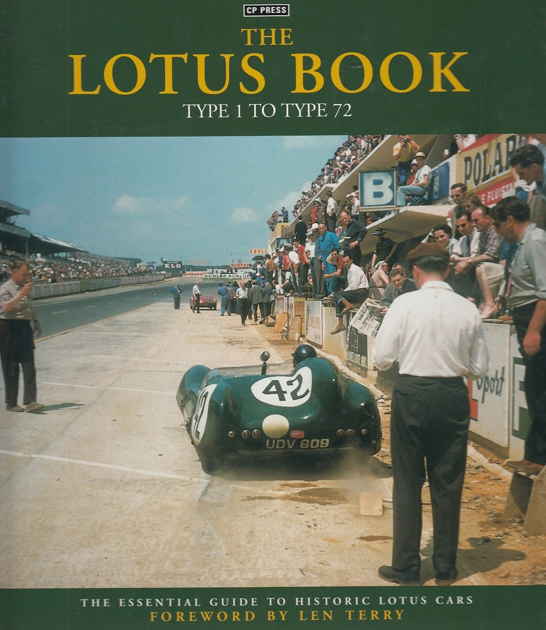 Lotus Book hardcover with title text and green vintage race car on track