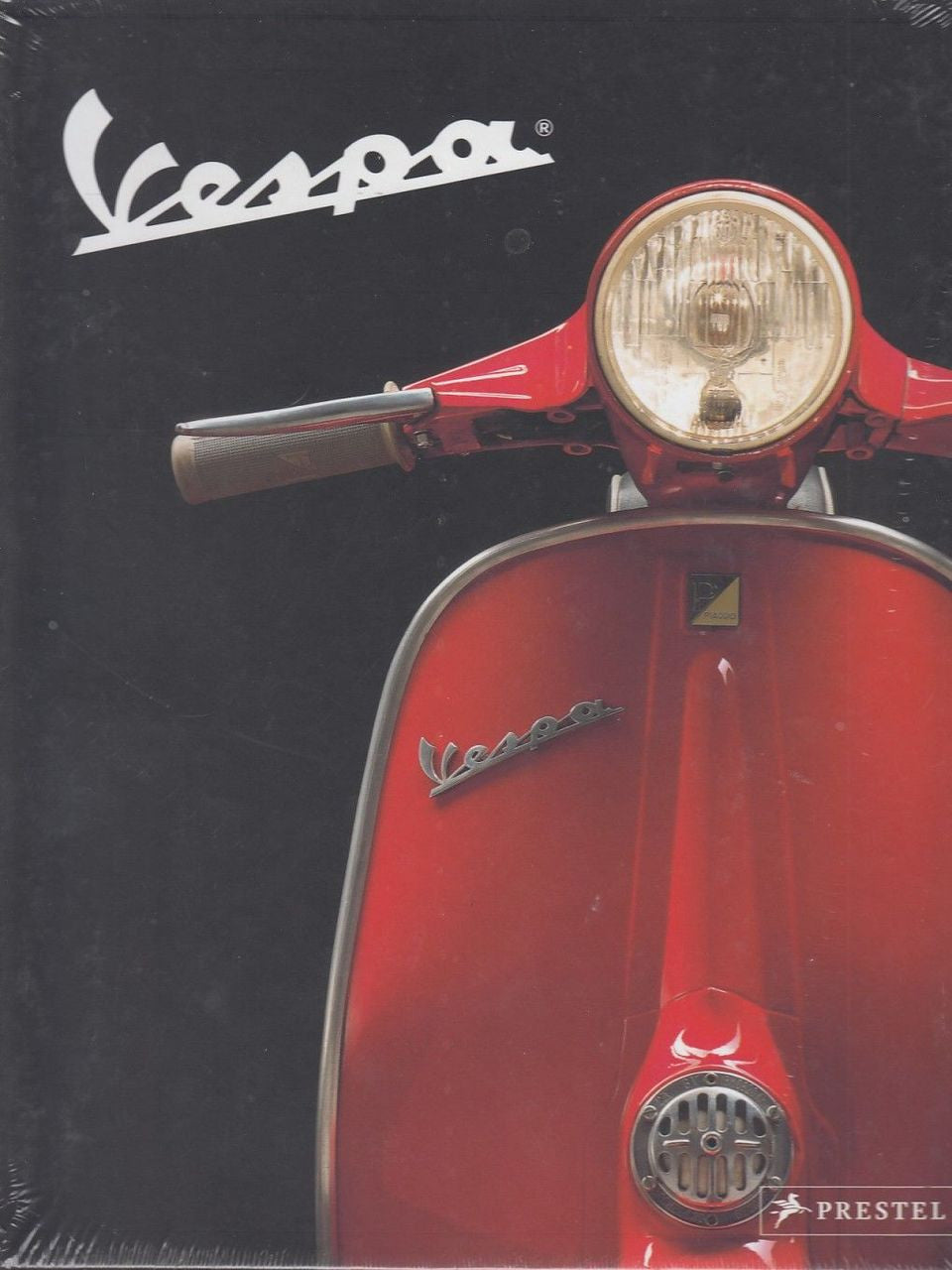 Vespa book cover featuring Vespa logo and red scooter front with headlight