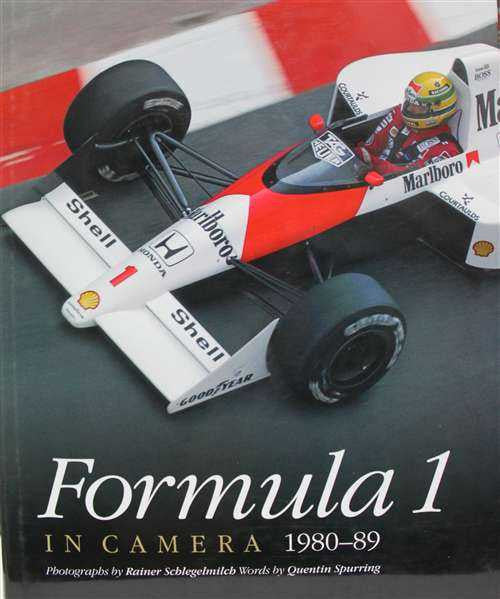 Hardcover race car photo book cover with Formula 1 title and driver in cockpit