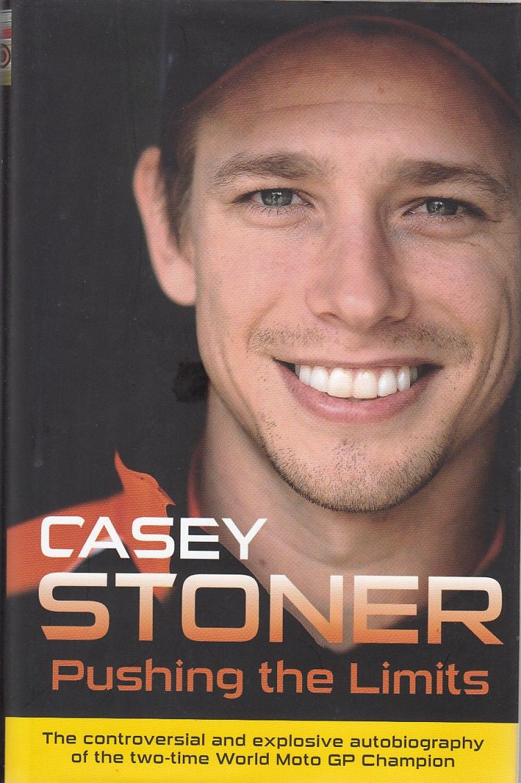 Hardcover autobiography front cover with Casey Stoner portrait and title 'Pushing the Limits'