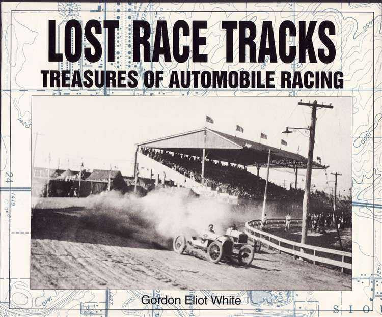 Book front cover with Lost Race Tracks title and vintage race car on track
