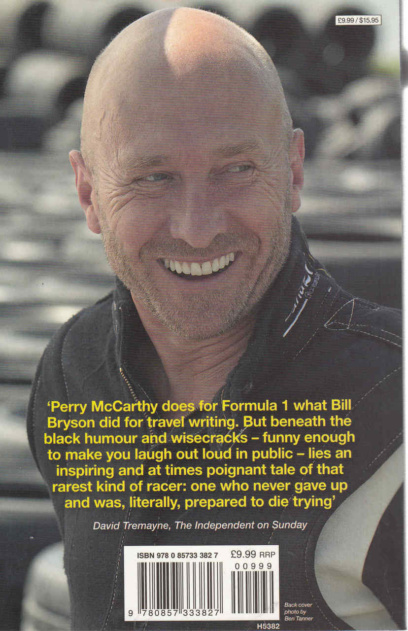 Motorsport book with smiling portrait, quote text, and barcode