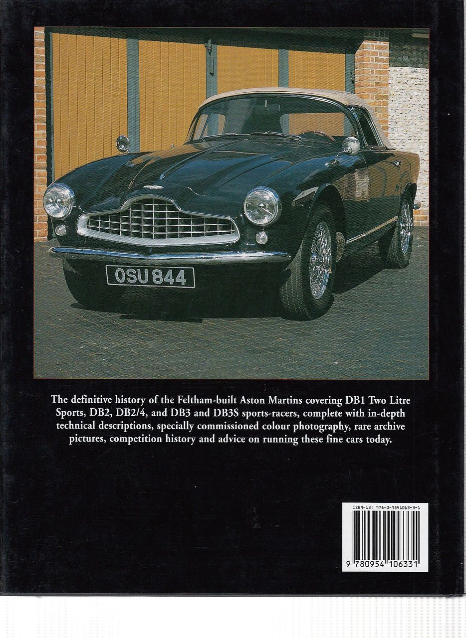 Classic car book back cover with dark green Aston Martin coupe photo