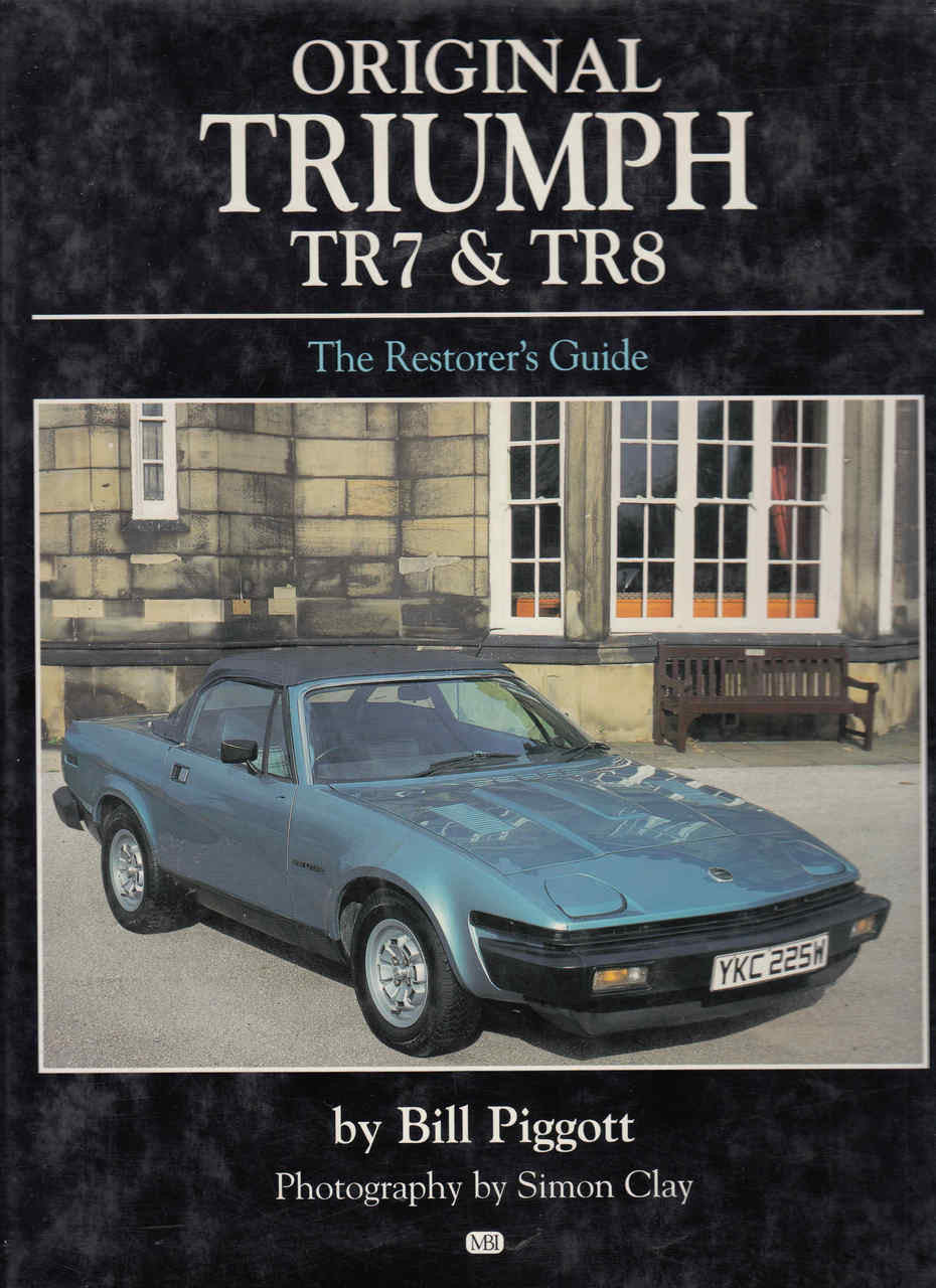 Automobile restorer's guide cover with blue classic car, author and title