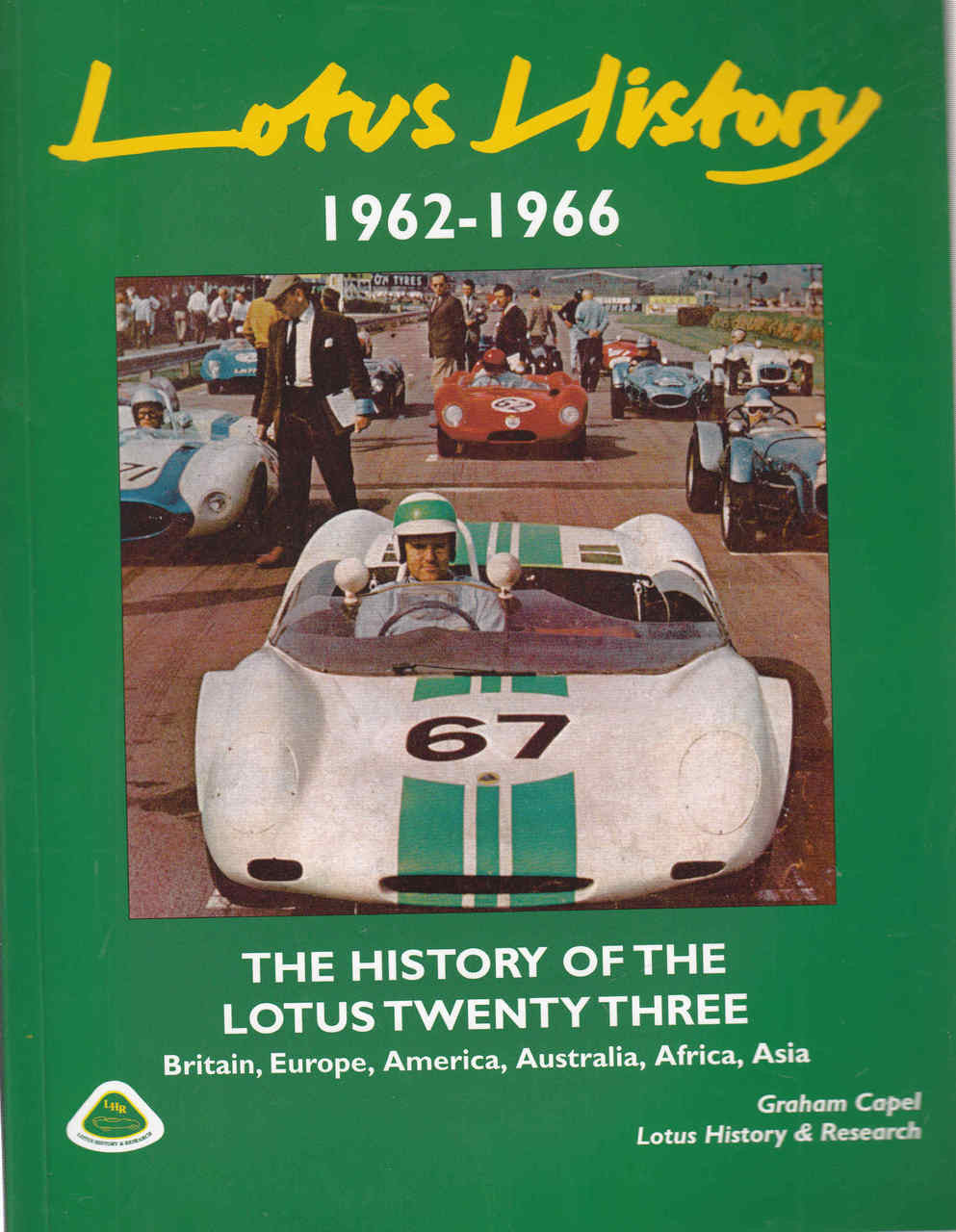 Green automotive history book cover with race car photo and number 67