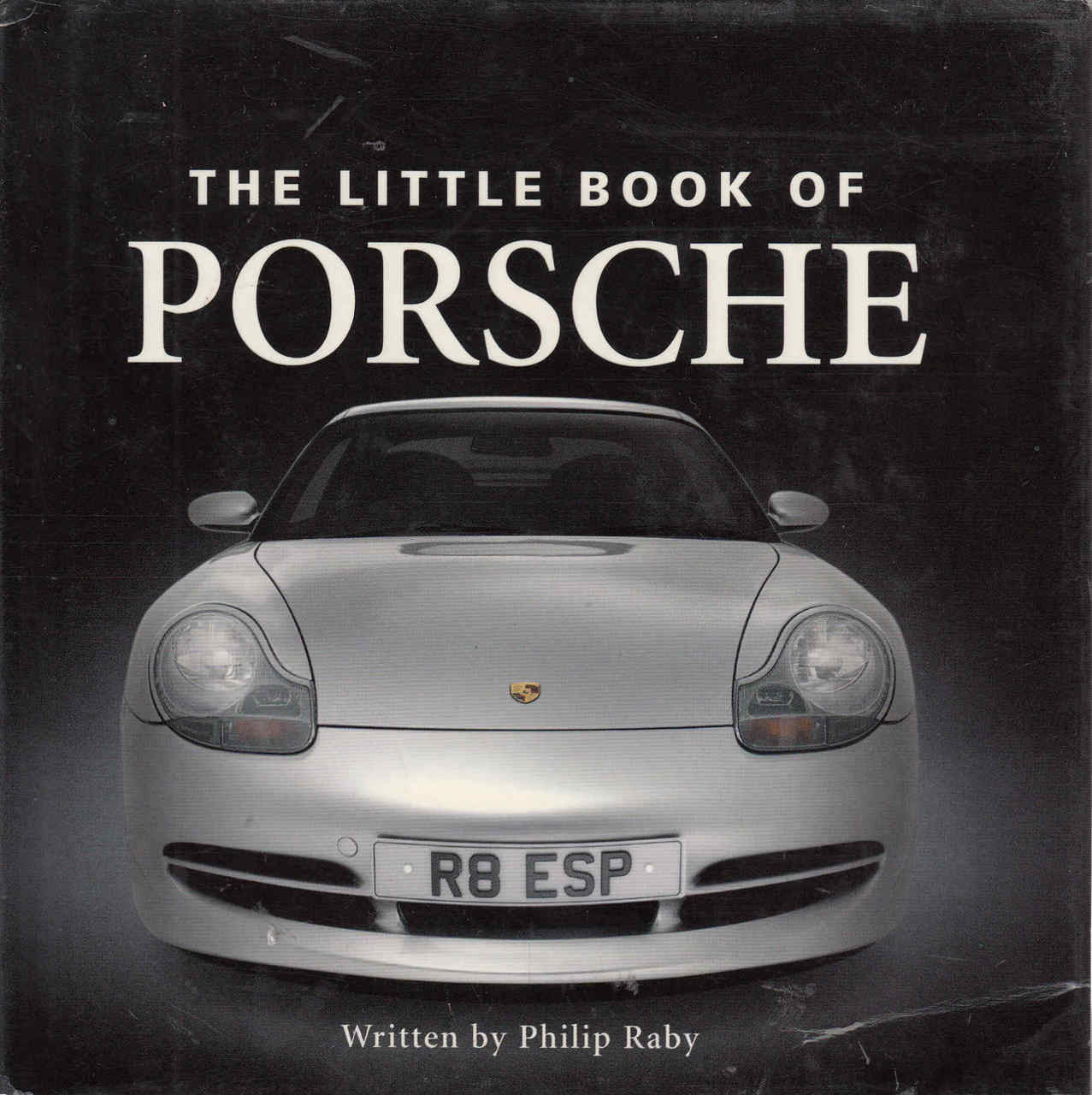 Porsche book cover with front car photo and title lettering
