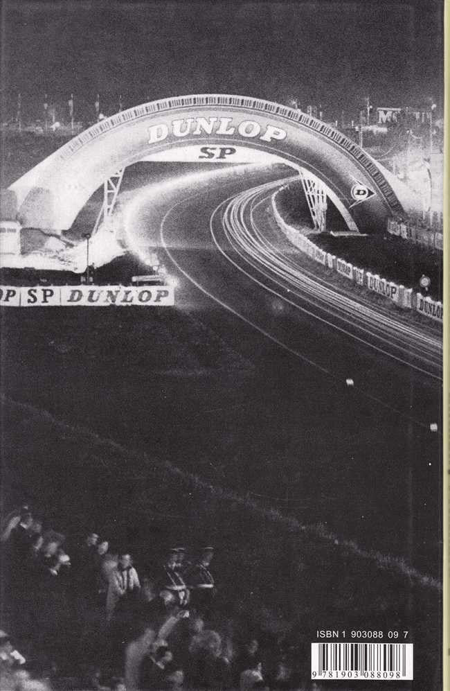 Motor racing book cover with track photo, DUNLOP SP banner, and barcode