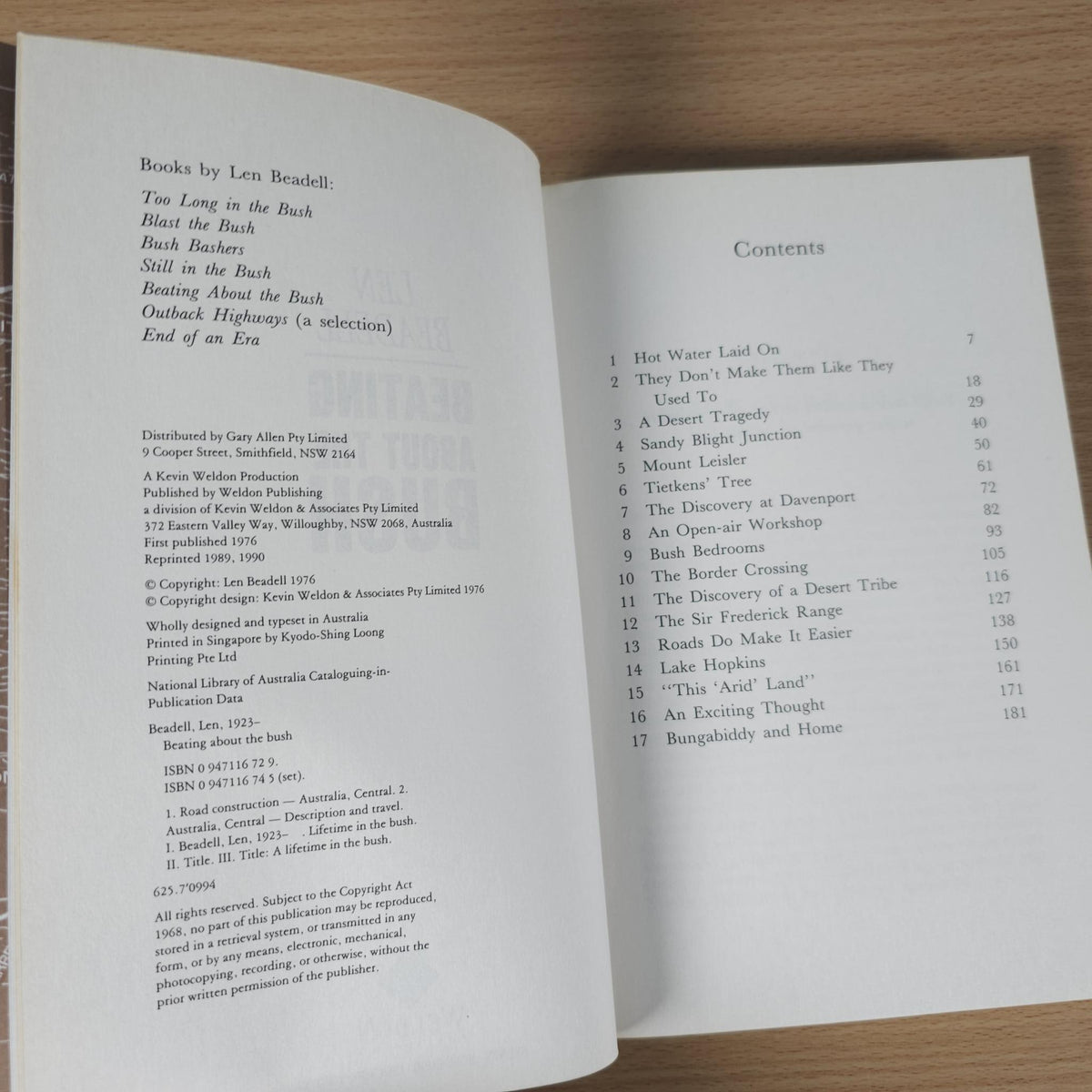 Open book showing contents list on two pages with headings and page numbers