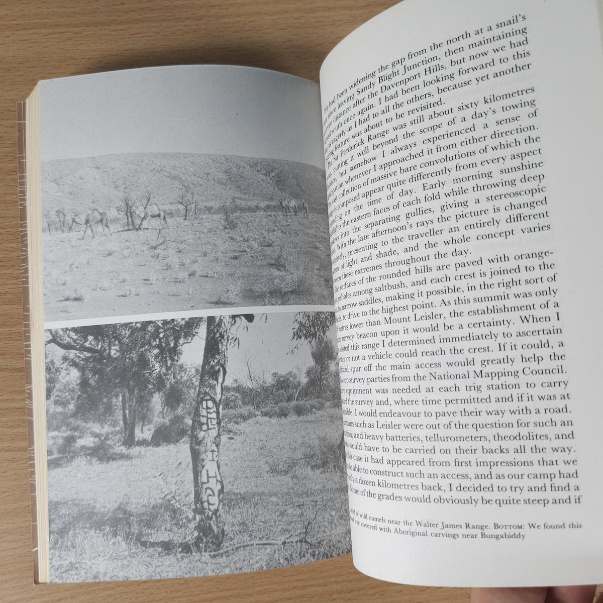 Open book spread with black-and-white desert photos and surrounding chapter text
