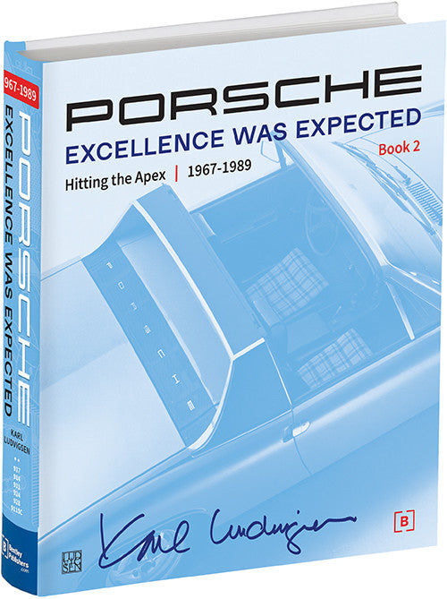 Porsche Excellence Was Expected Book 2 hardcover with blue graphic cover