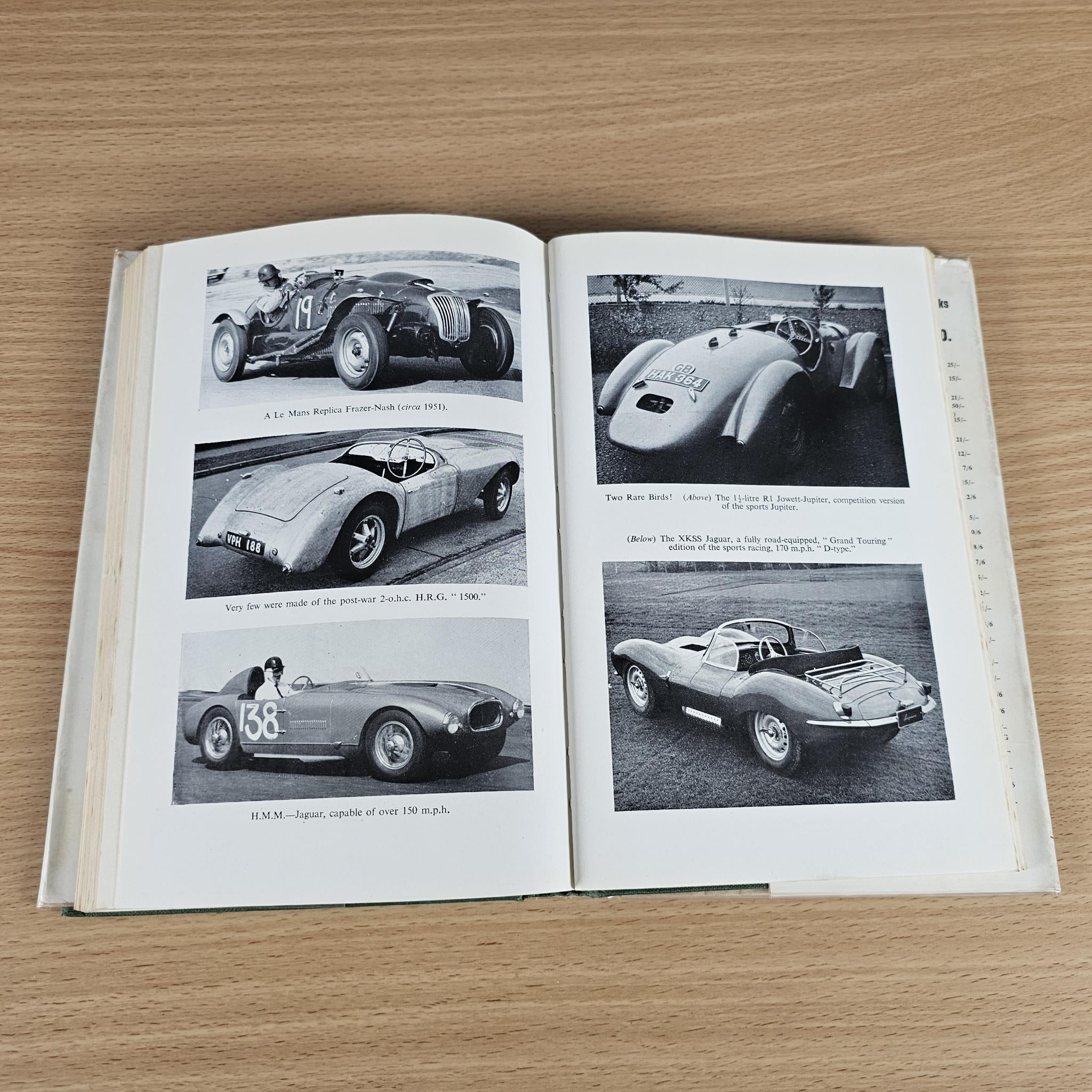 Open book spread with black-and-white photos of classic sports cars