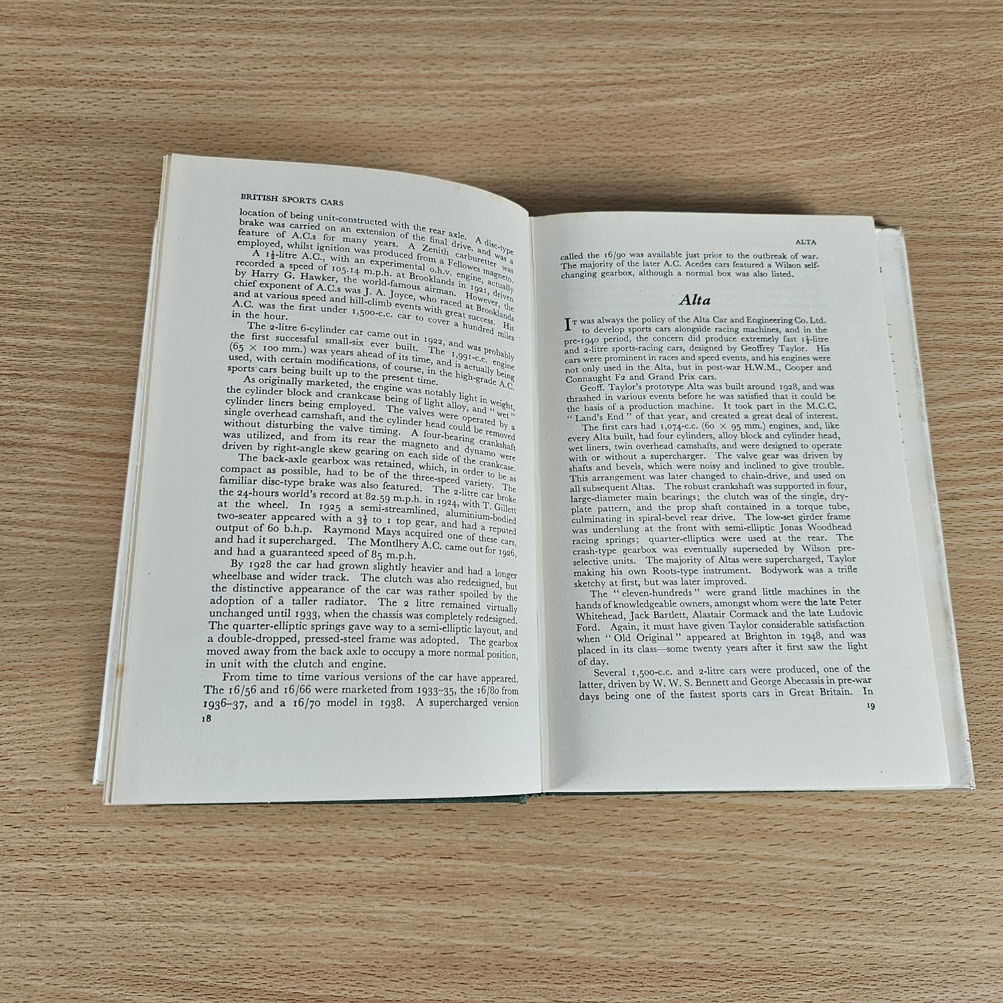 Open book with article text and a page section labeled “Alfa” on the right.